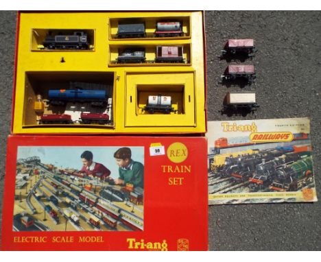 Triang model railways - a boxed train set comprising 0-6-0T tank locomotive, op no 47606, black BR livery, eleven goods wagon