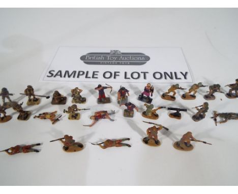 A quantity of vintage hand painted military models, predominantly metal