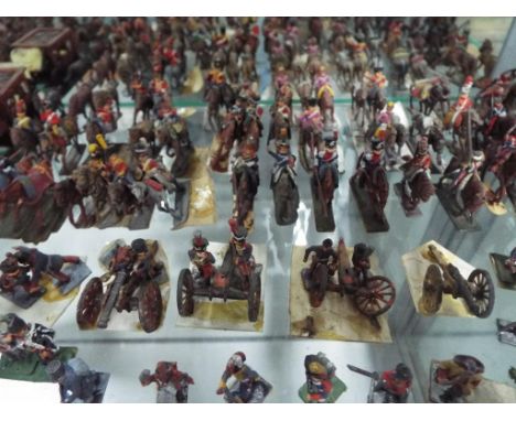 A quantity of vintage hand painted military models, predominantly metal
