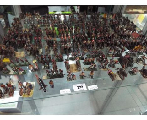 A quantity of hand-painted vintage models predominantly metal of military figures