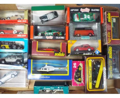 A collection of sixteen diecast model motor vehicles, Solido, Corgi, Cararama, Quartzo and other, mint in box