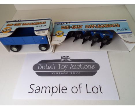 ERTL - 12 metal replica diecast Implements, 1:32 scale comprising six wagons and six plows (sic) mint in boxes, stock no 1951