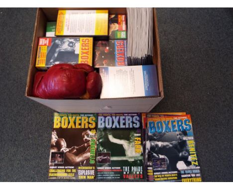 Boxing - A large quantity of "Boxers" videos and magazine sets and a pair of vintage boxing gloves.