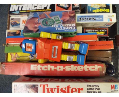 A lot to include a quantity of vintage toys and board games to include Twister, Etch-a-Sketch, Cluedo, Connect 4, Electronic 