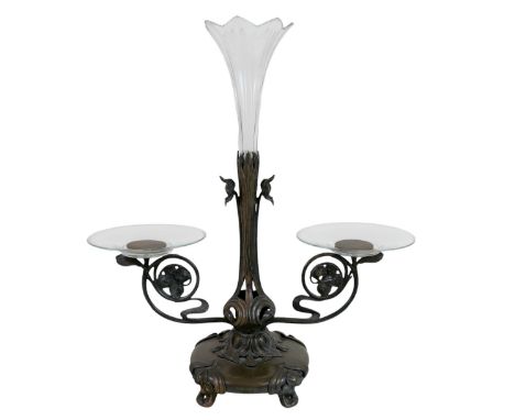 A silver plated Art Nouveau centre piece marked FRAGET N PLAQUE 4135 with a central glass epergne and two side sweet meat dis
