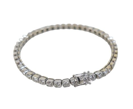 An 18ct white gold diamond tennis bracelet, forty-five round cuts diamonds, each stone approximately 2.5mm diameter, bracelet