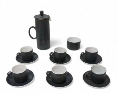 A Briglin Pottery coffee set bought from Heals, including coffee pot, sugar bowl, six cups and saucers. (14)