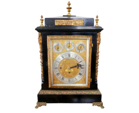 A George III ormolu mounted ebonised musical table clock by Shuttleworth of Salisbury, with a triple fusee movement chiming o
