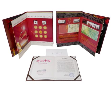 Beijing 2008 Olympics memorabilia: a commemorative briefcase containing two volumes of presentation items titled 'China's Pri