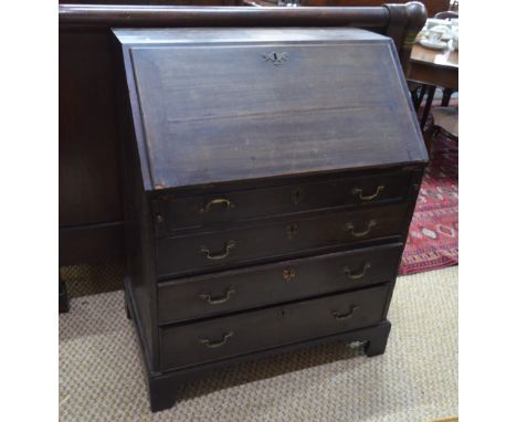A 19th century mahogany bureau, the fall enclosing a fitted interior over four long graduated drawers on shaped bracket feet