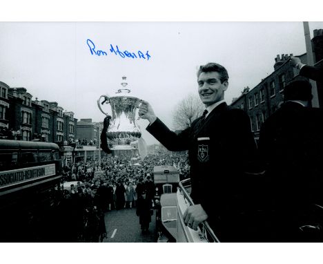 Ron Henry signed Tottenham Hotspur 1961 black and white photo. Ronald Patrick Henry (17 August 1934 - 27 December 2014) was a