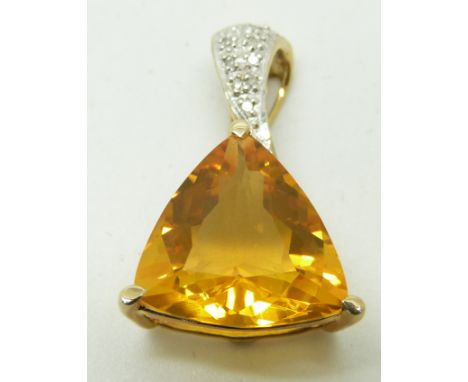 A 9ct gold pendant set with a trilliant cut fire opal and diamonds, 2.8g,&nbsp;