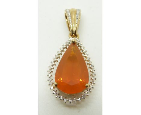 A 9ct gold pendant set with a pear cut&nbsp;Buriti fire opal and diamonds, 5.9g