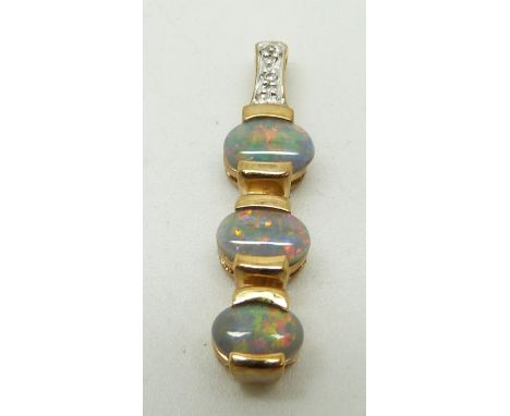 A 9ct gold ring set with three black opal cabochons and diamonds, 1.8g weight of pendant 1.7g