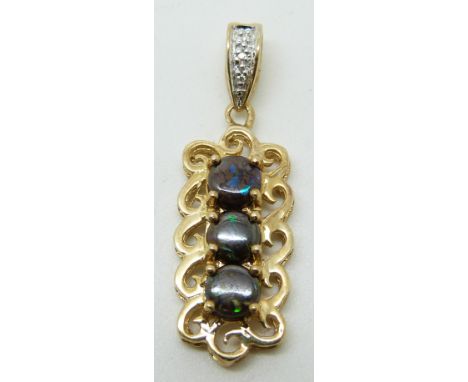 A 9ct gold pendant set with three round cut boulder opals and diamonds, 2.9g