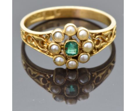 Victorian 18ct gold ring set with an emerald surrounded by seed pearls, with filigree shoulders and engraved band, maker B.H.