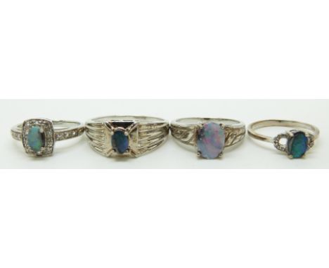 Four silver rings set with boulder opal, size L, M, N, T 