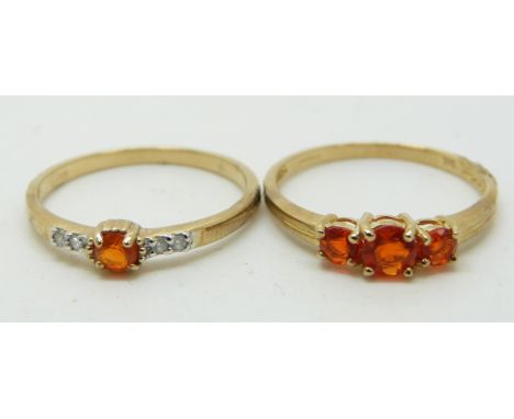 Two 9ct gold rings, one set with a Mexican fire opal and diamonds and the other three fire opals, 2.6g, size N