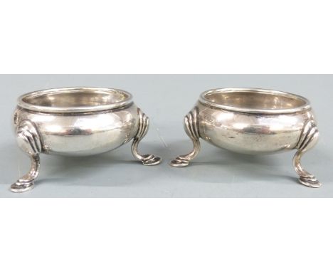 George V pair of hallmarked silver salts in the Georgian style, raised on three feet, London 1912 maker&nbsp;Haseler Brothers