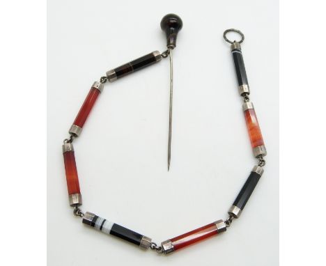 Victorian silver and banded agate cloak clasp, the single 10cm pin with polished agate top, the chain made up of eight hexago