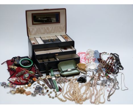 A large collection of costume jewellery including beads, vintage watch, faux pearls, Czech brooch, etc