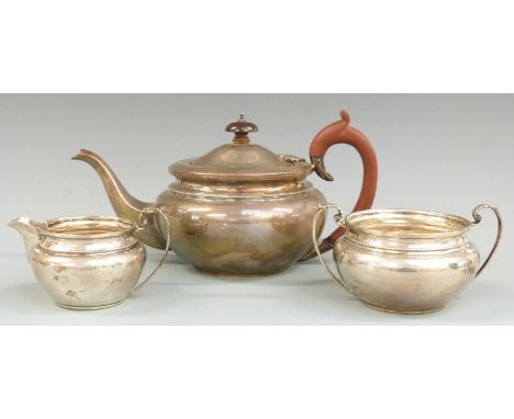 George V hallmarked silver three piece teaset, Birmingham 1931 maker&nbsp;William Adams Ltd, length of teapot 27.5cm, weight 