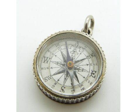 Victorian hallmarked silver compass charm, verso a seascape scene, Birmingham 1881, 2.4cm diameter