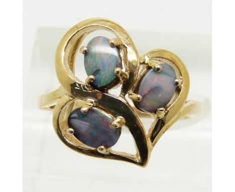 A 9ct gold ring set with three Australian boulder opals, 3.4g, size N