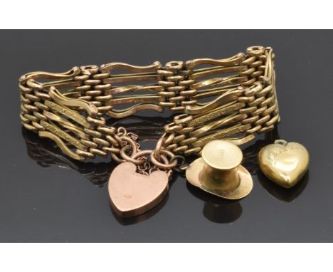A 9ct gold gate bracelet with heart clasp, a 9ct gold top hat charm and a 9ct gold heart pendant, 19.5g