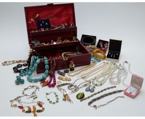 A collection of costume jewellery including rings, vintage earrings including Swarovski and Trifari, a set of silver studs, s