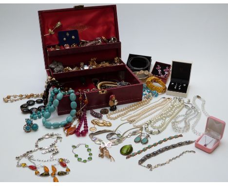 A collection of costume jewellery including rings, vintage earrings including Swarovski and Trifari, a set of silver studs, s