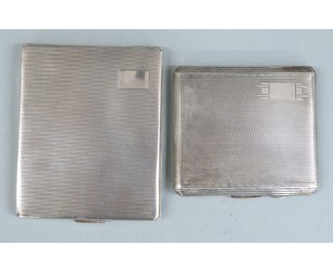 Two hallmarked silver cigarette cases, both with engine turned decoration, weight 266g all in