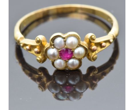 Victorian 18ct gold ring set with a ruby surrounded by split pearls, size R