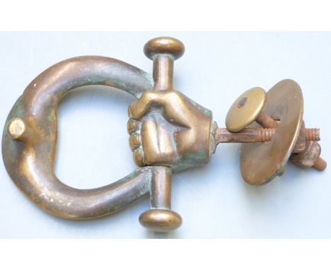 19thC brass hand door knocker with plate and fittings, height 15cm