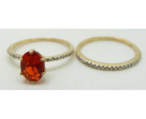 A 9ct gold ring set with an oval cut Salamanca fire opal and white sapphires and a matching half eternity ring, 2.5g, size N