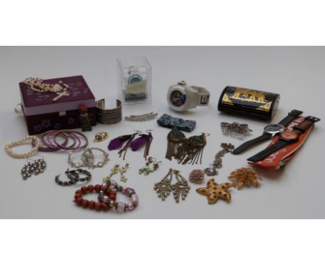 A collection of costume jewellery including amethyst, beaded necklaces, vintage brooches, etc&nbsp;