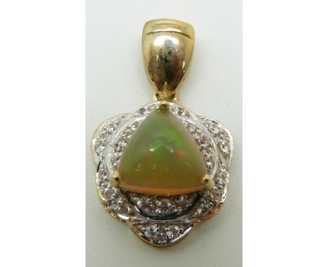 A 9ct gold pendant set with a trilliant cut Kalimaya opal surrounded by white sapphires, 4.2g