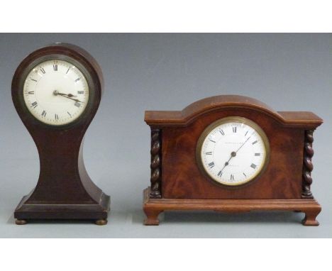 A late 19thC French balloon cased mantel clock with Roman enamelled dial, red Arabic quarters and spade hands, the mahogany c