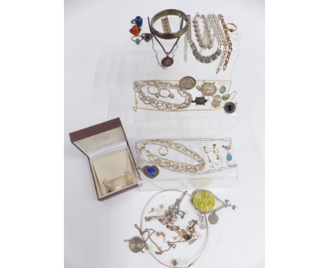 A collection of silver and paste jewellery including ingot, thimble, St Christoper, bangle, necklaces, bracelet, rings, etc&n