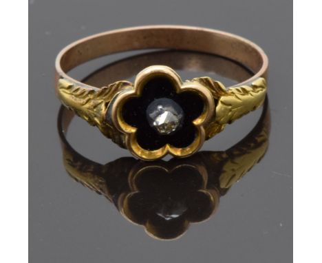 Georgian / Victorian ring in the form of a flower set with black enamel and a rose cut diamond with foliate decoration to the