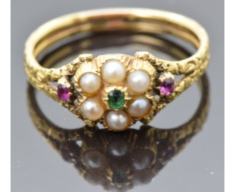 Victorian ring set with an emerald, split pearls and rubies with an engraved band, size N