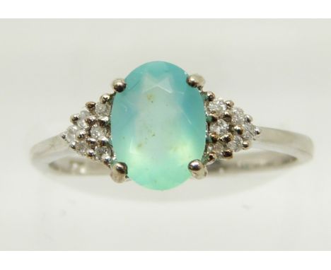 A 9ct white gold ring set with an oval cut Paraiba opal and diamonds, 1.9g, size N