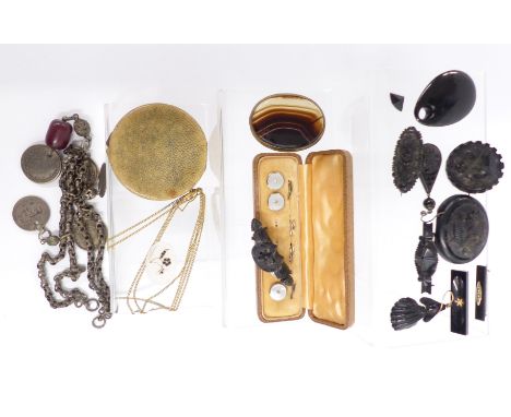 A collection of Victorian jet brooches including one depicting a horseshoe, carved jet earrings, studs, shagreen compact, etc