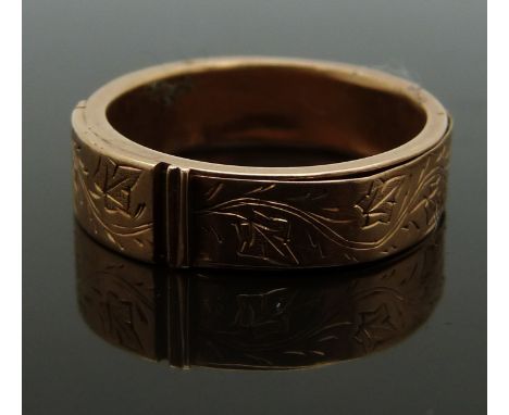 Victorian mourning ring with chased foliate decoration, opening to reveal a hollow section originally for hair, size Q/R, 3.0
