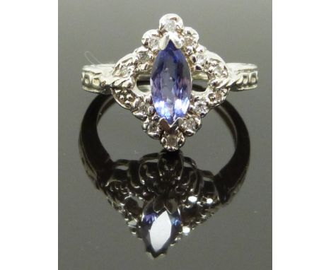 A 14ct white gold ring set with a marquise cut amethyst and diamonds, size K, 4.00g&nbsp;