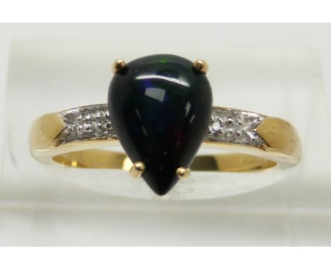 A 9ct gold ring set with a pear cut Mezezo cut opal cabochon and diamonds, 2.7g, size N