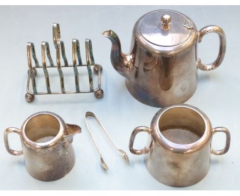 Silver plated tea service comprising teapot, milk jug, sugar, sugar nips and a toast rack