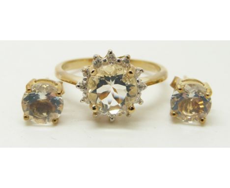 A 9ct gold ring set with a round cut ice opal and zircon and a pair of similar earrings, 3.2g, size M