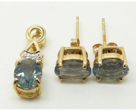 A 9ct gold pendant set with an oval cut blue fire opal and diamonds and a pair of similar earrings, 2.7g