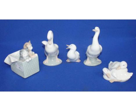 FIVE NAO ANIMAL FIGURESincluding four of ducks and a basket with two kittens, largest 14cm high